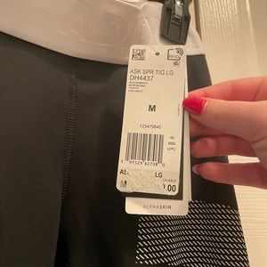 Women’s Adidas Alphaskin leggings with Logo size medium with tags